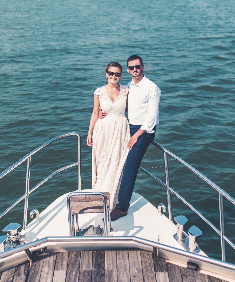 Wedding Party Toasting on Private Yacht with Jacksonville Views